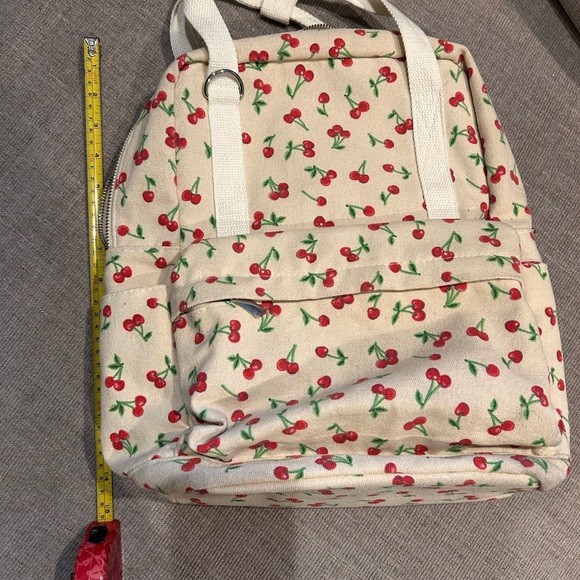 Cream cherry backpack. - Picture 6 of 7